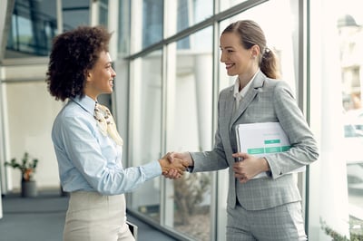 business handshake women